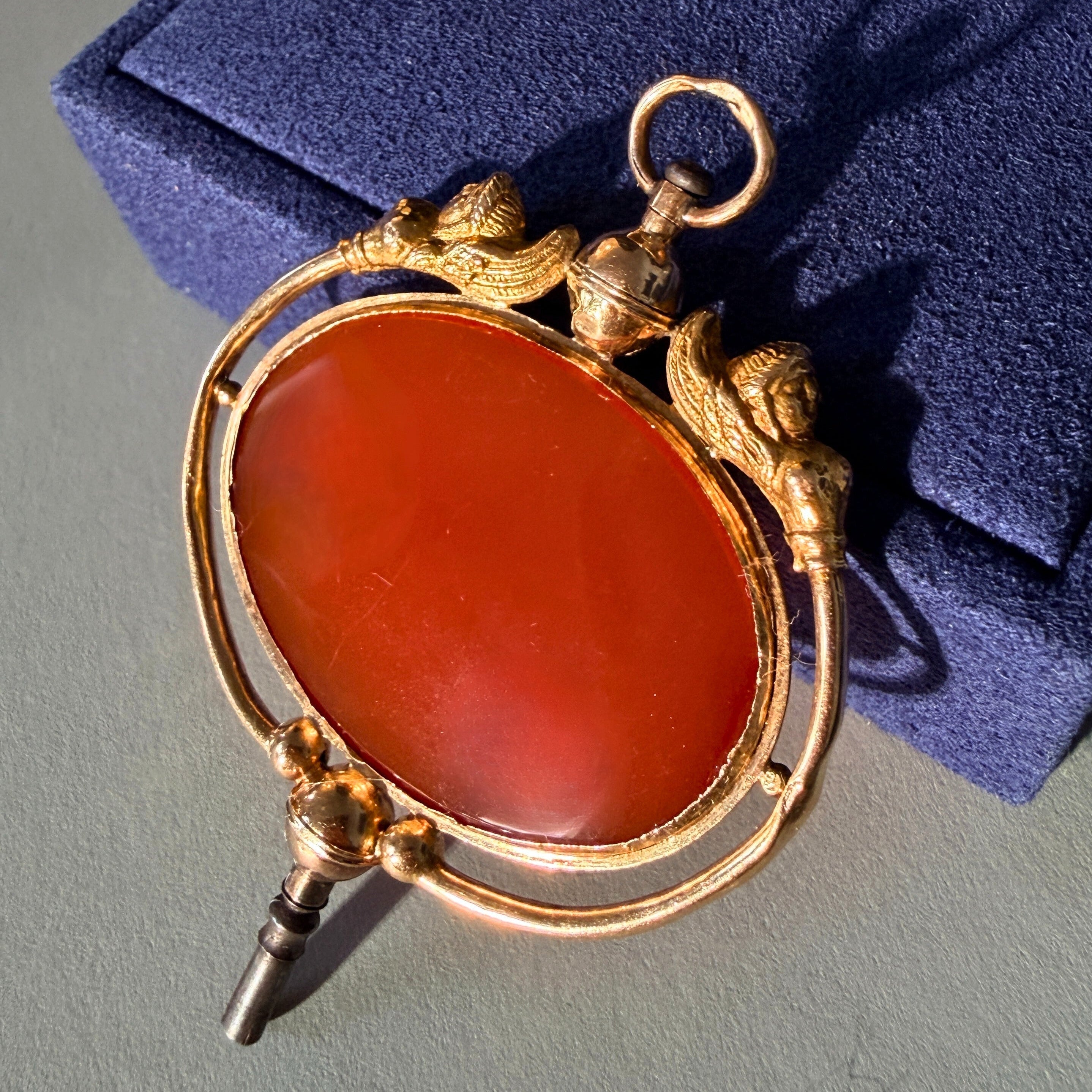 Victorian era 18K gold Egyptomania cornelian watch key pendant