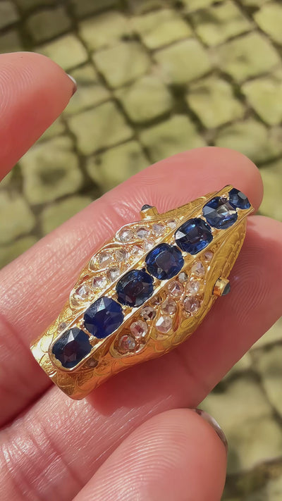 Antique 18K gold blue sapphire diamond snake head brooch