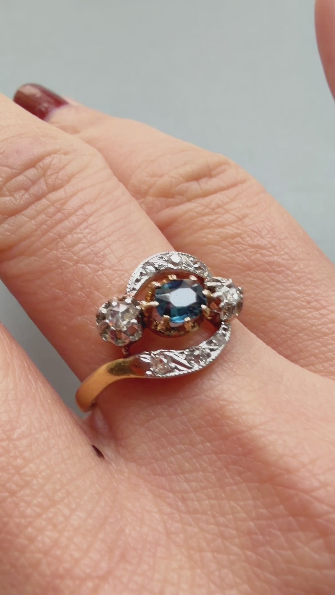 Antique 18K gold blue sapphire diamond tourbillon ring