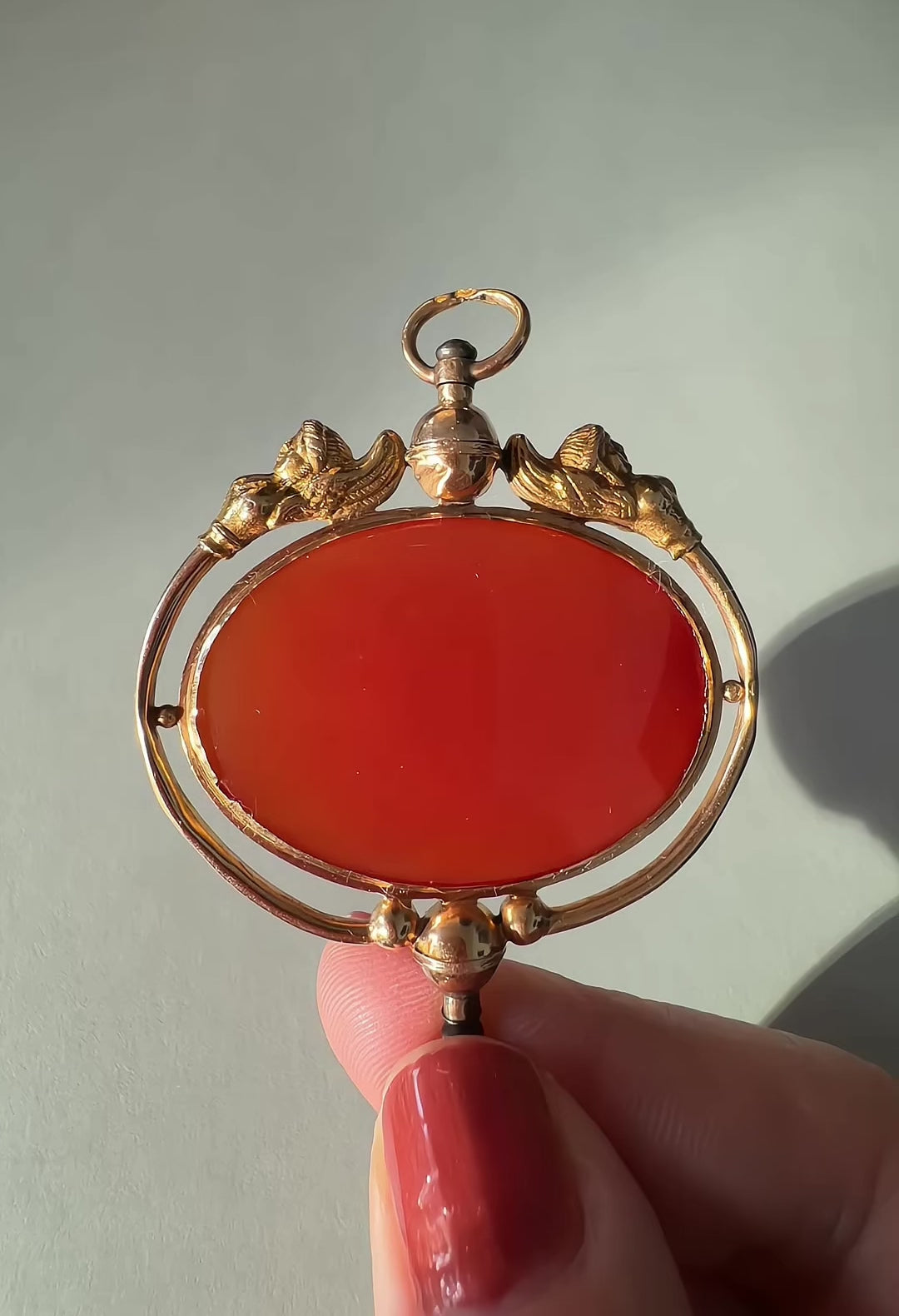 Victorian era 18K gold Egyptomania cornelian watch key pendant