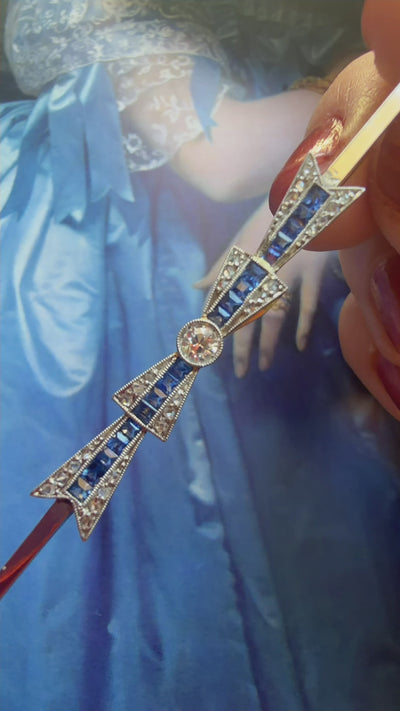 Art Deco 18K gold diamond sapphire bow brooch