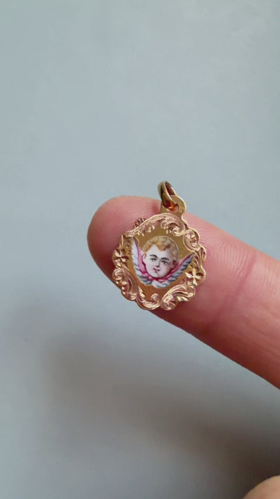 Victorian era 18K gold enameled angel cherub medal pendant