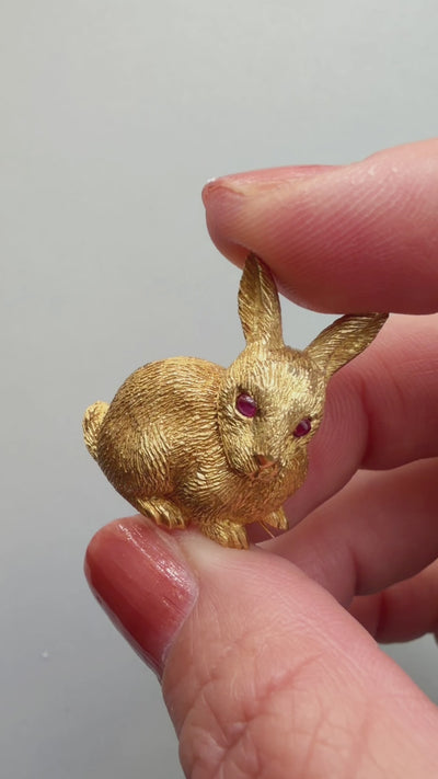 18k yellow gold rabbit brooch with ruby eyes