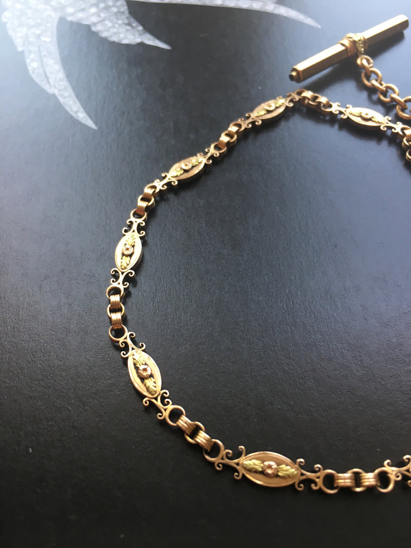 Floral & very rare Victorian 18K gold chain with a T-bar