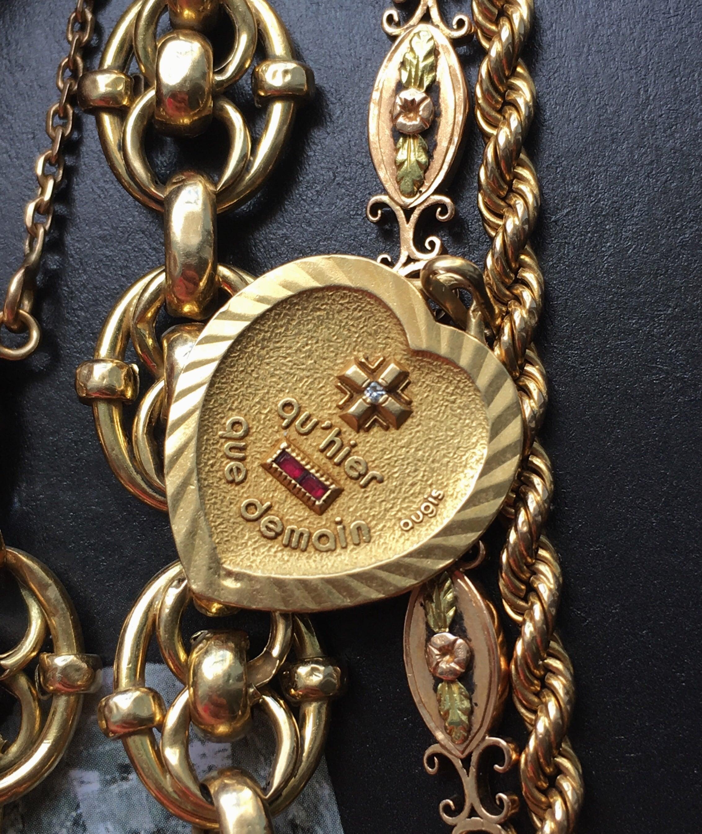 Lovely Augis 18K gold “more than yesterday, less than tomorrow” heart shape pendant medal - Curiously timeless