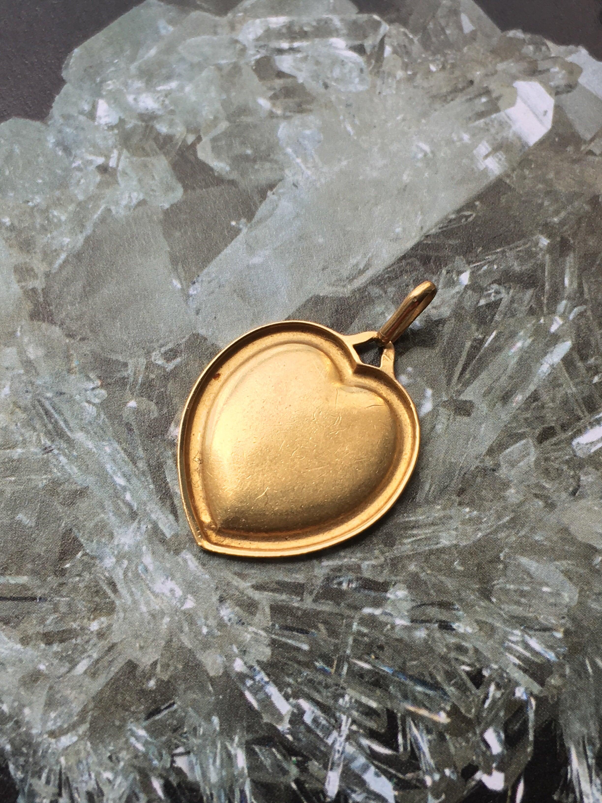 Lovely Augis 18K gold “more than yesterday, less than tomorrow” heart shape pendant medal - Curiously timeless