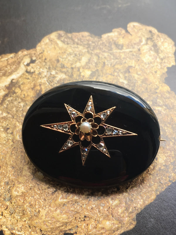 Elegant Victorian era gold diamond pearl onyx star locket brooch