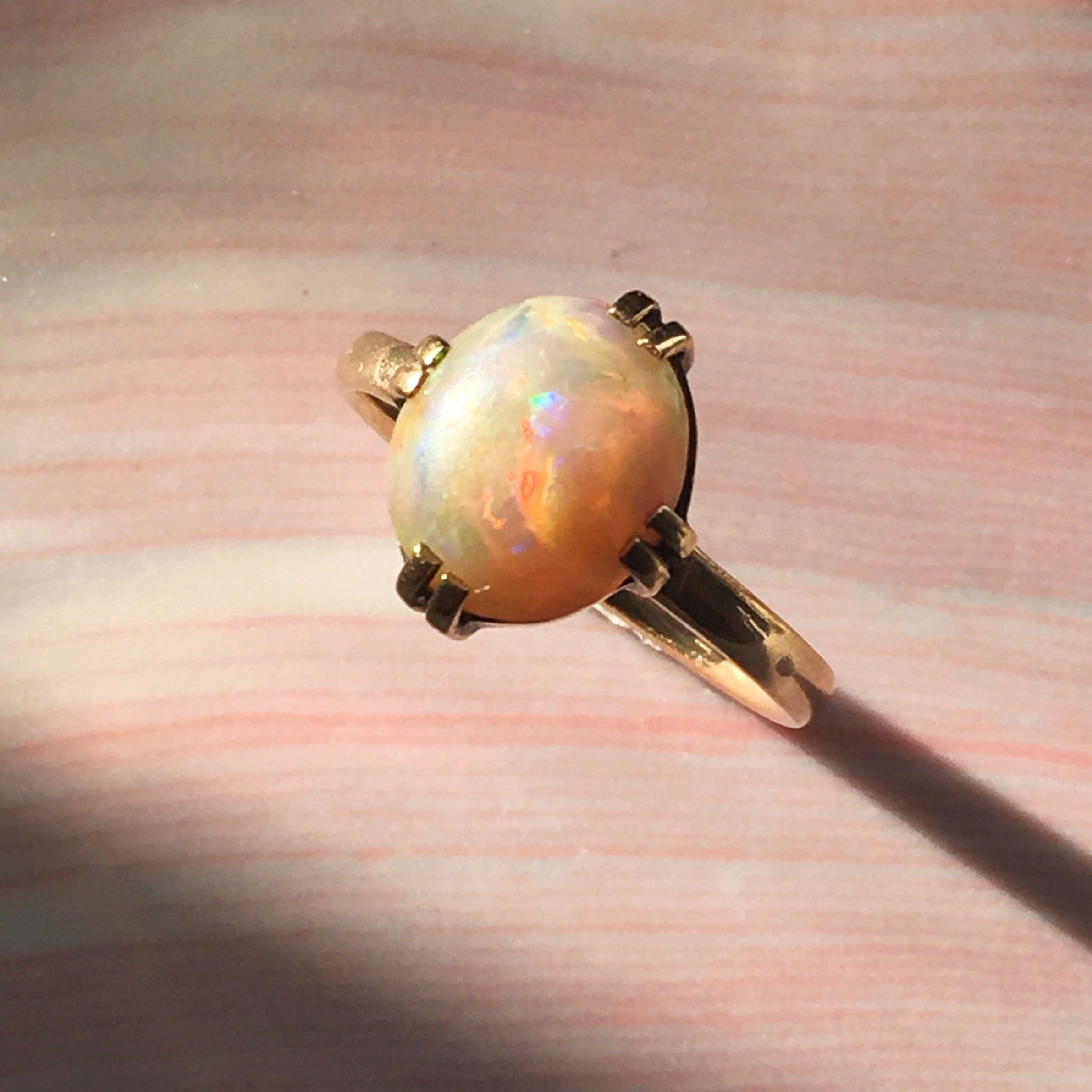 Magic rainbow 14k yellow gold opal cabochon solitaire ring - Curiously timeless