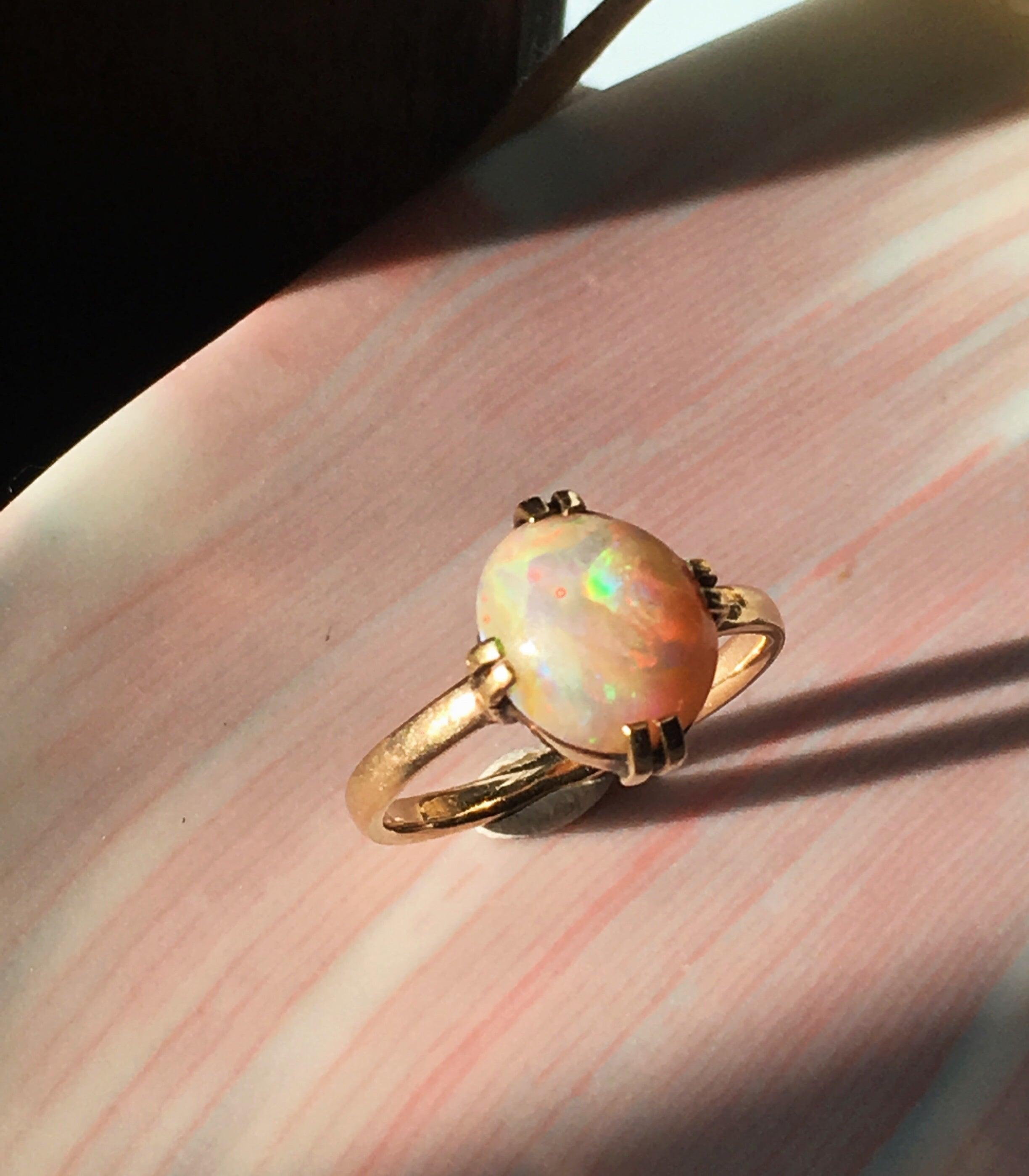 Magic rainbow 14k yellow gold opal cabochon solitaire ring - Curiously timeless