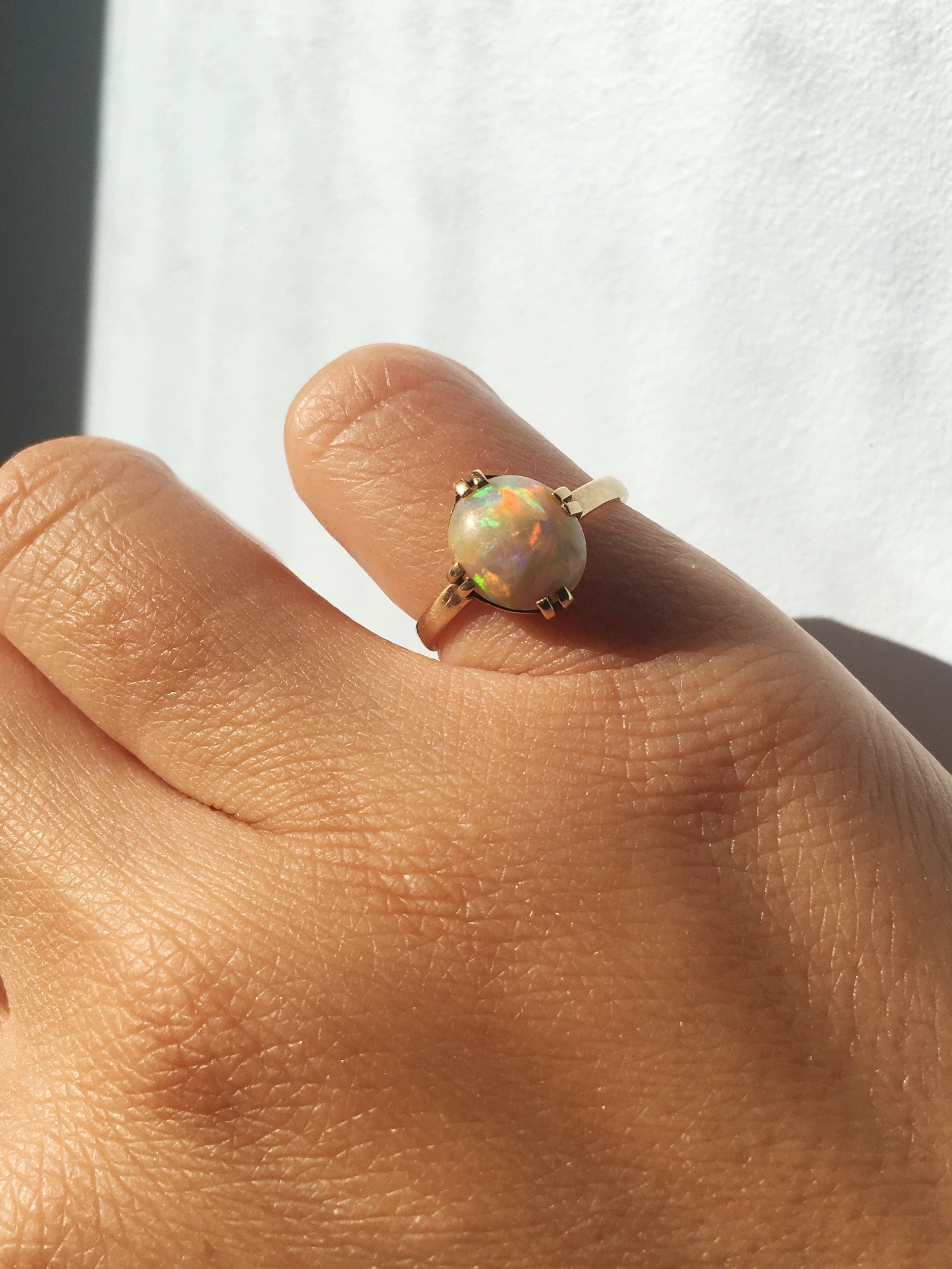 Magic rainbow 14k yellow gold opal cabochon solitaire ring - Curiously timeless