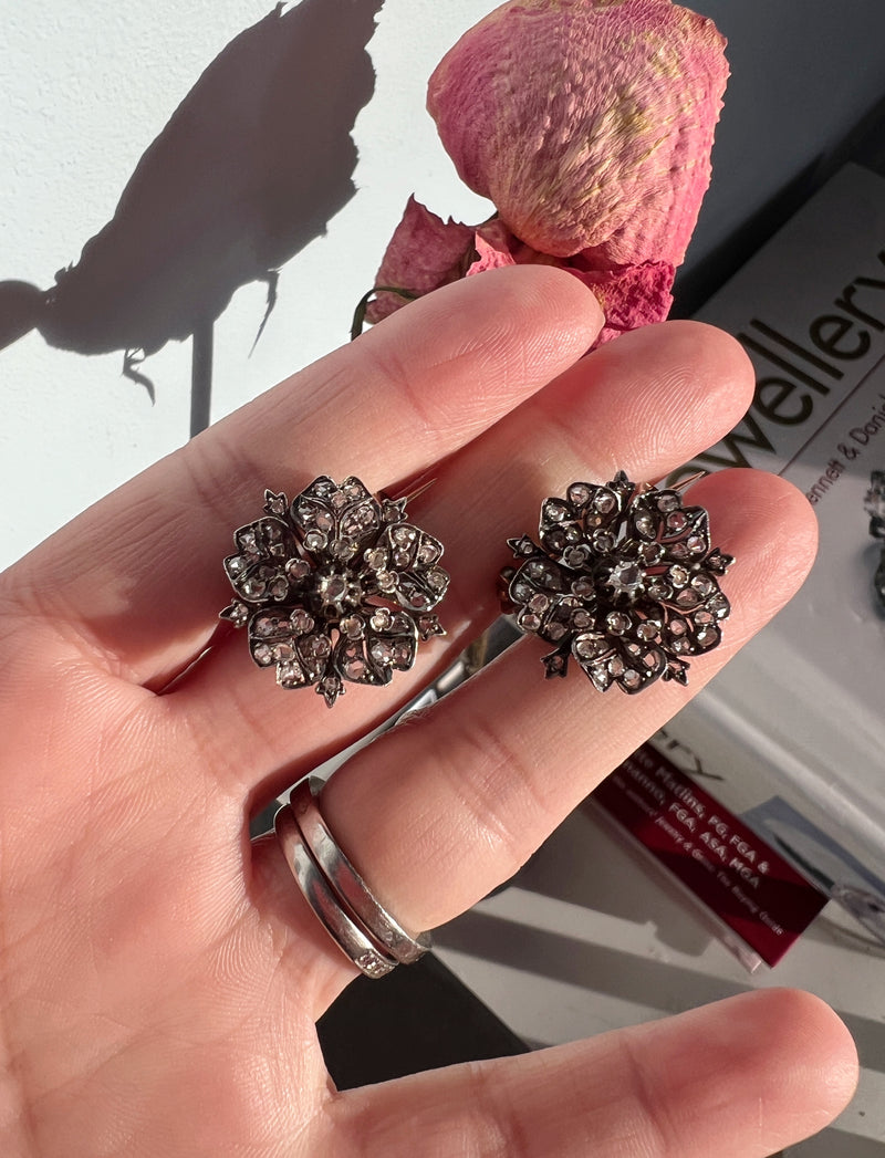 Pair of Victorian era 18K gold double diamond flower brooches