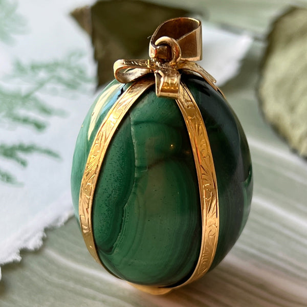 Magnificent bejeweled French antique 18K gold malachite ribbon egg pendant