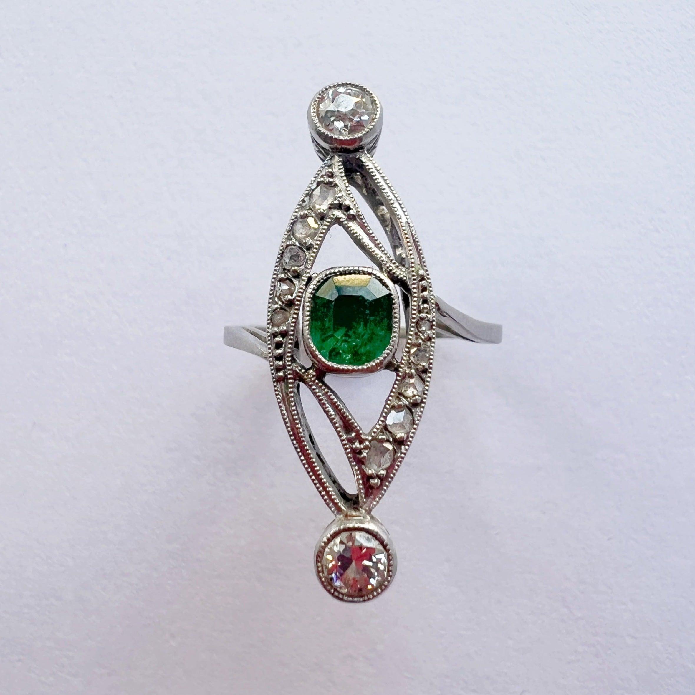 Platinum emerald diamond marquise ring - Curiously timeless