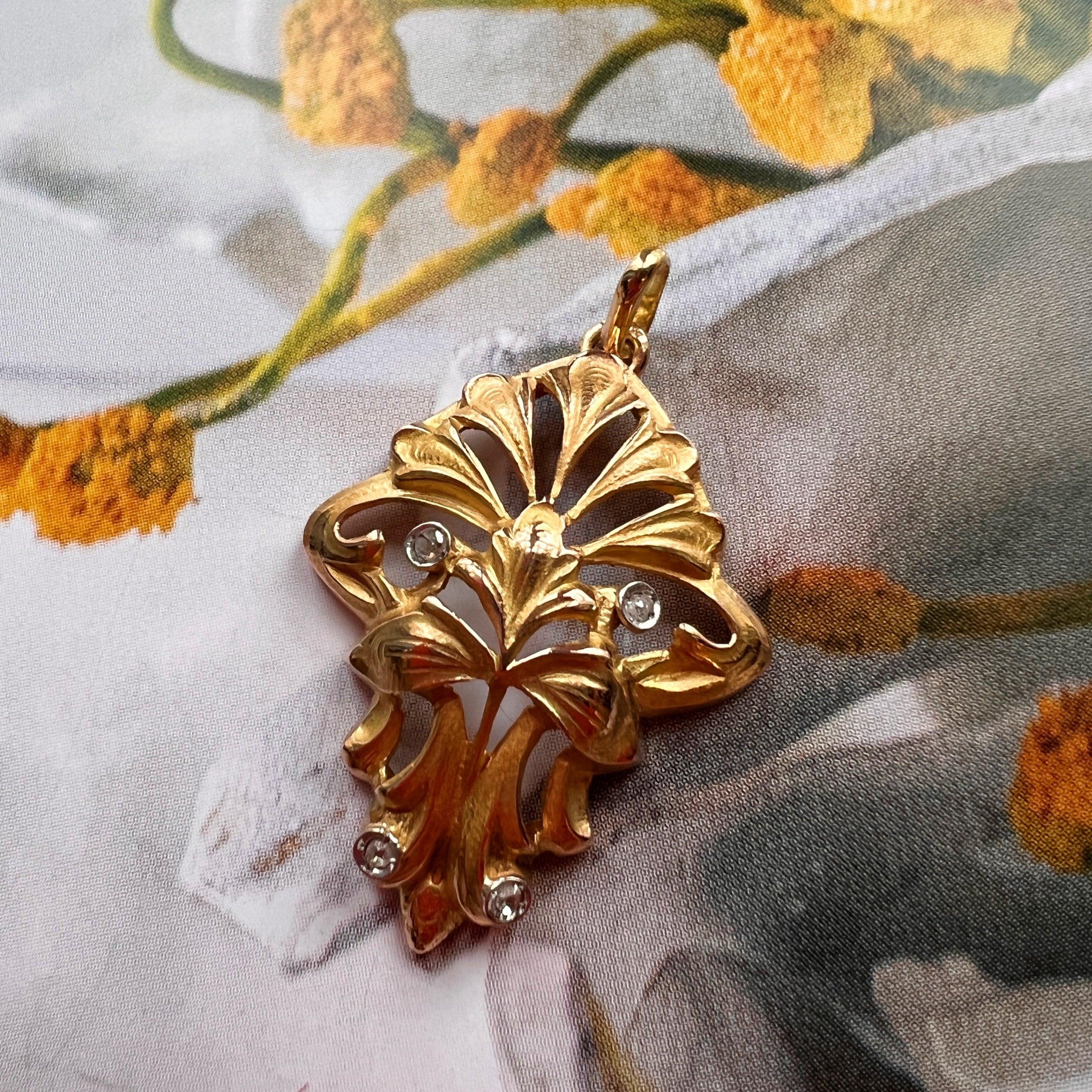 Elegant French Art Nouveau 18K gold Diamond Lily Flower pendant - Curiously timeless