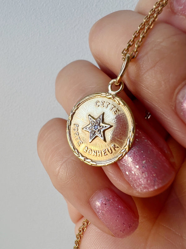 French 1920s 18K diamond star medal pendant « this star brings happiness”