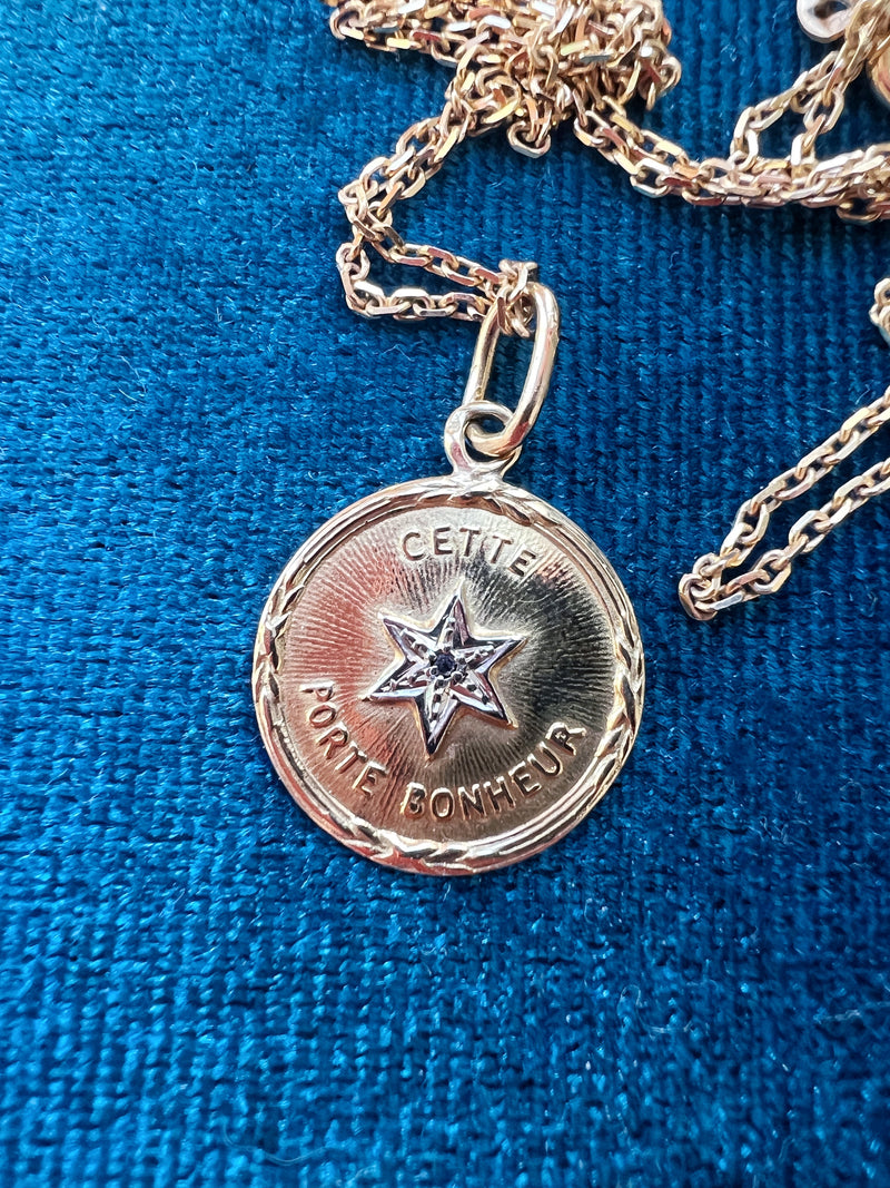 French 1920s 18K diamond star medal pendant « this star brings happiness”