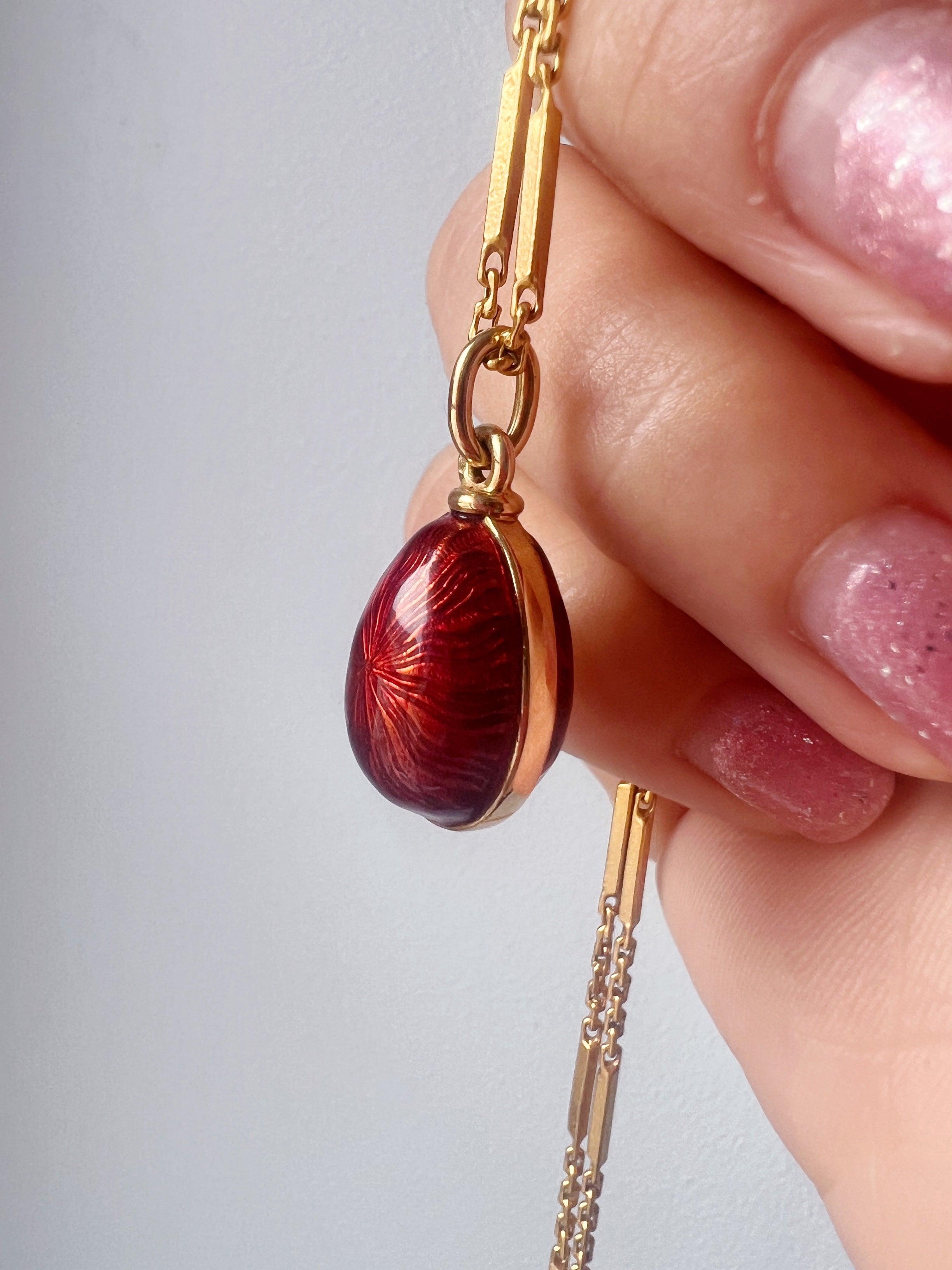 Beautiful Russian style 18K gold red enameled egg pendant - Curiously timeless