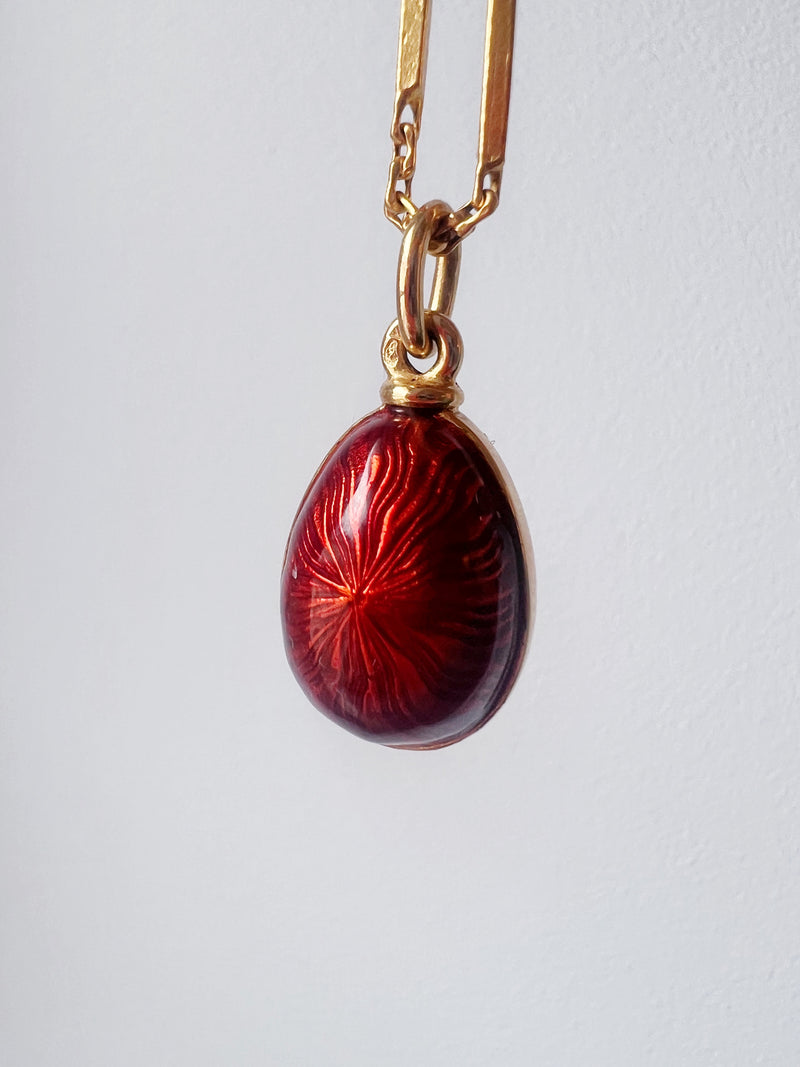 Beautiful Russian style 18K gold red enameled egg pendant