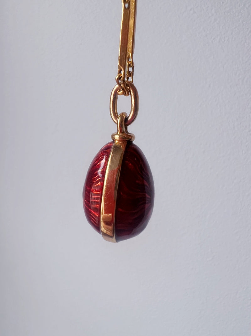 Beautiful Russian style 18K gold red enameled egg pendant