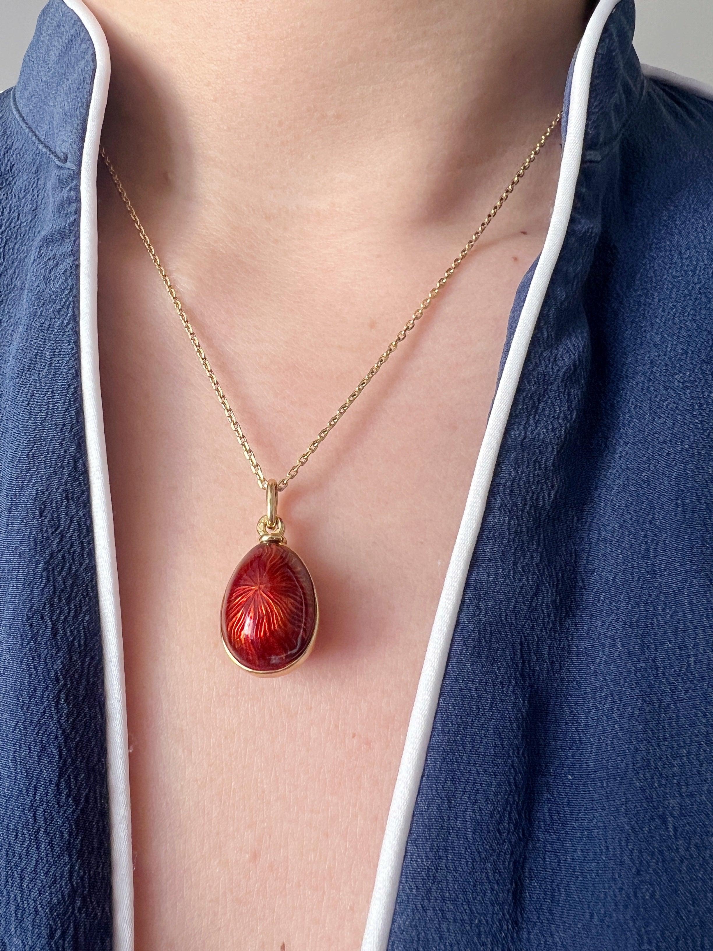 Beautiful Russian style 18K gold red enameled egg pendant - Curiously timeless