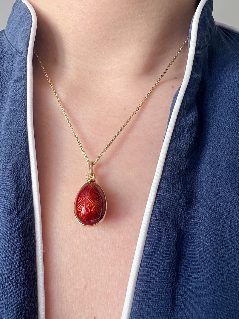 Beautiful Russian style 18K gold red enameled egg pendant