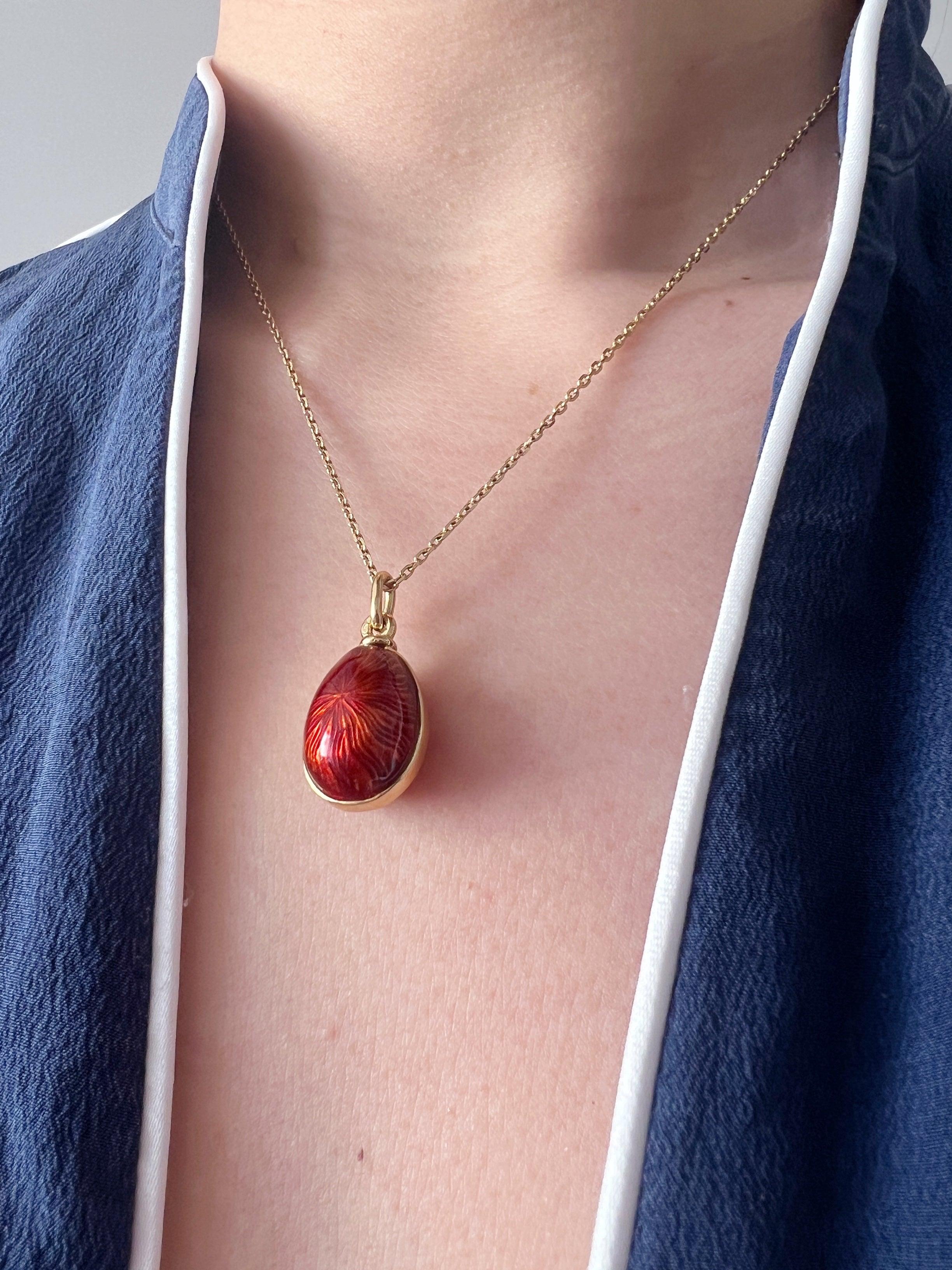 Beautiful Russian style 18K gold red enameled egg pendant - Curiously timeless