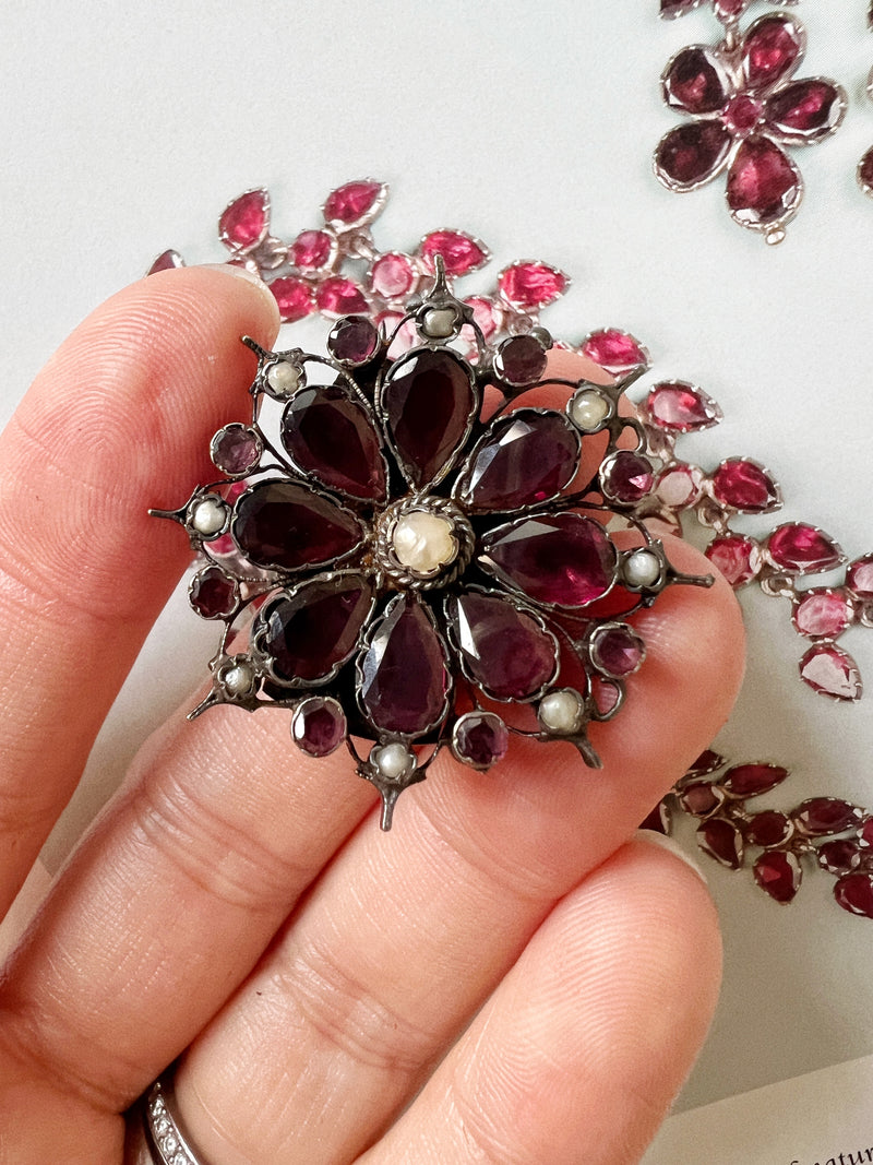 Georgian era flat cut garnet seed pearl flower brooch