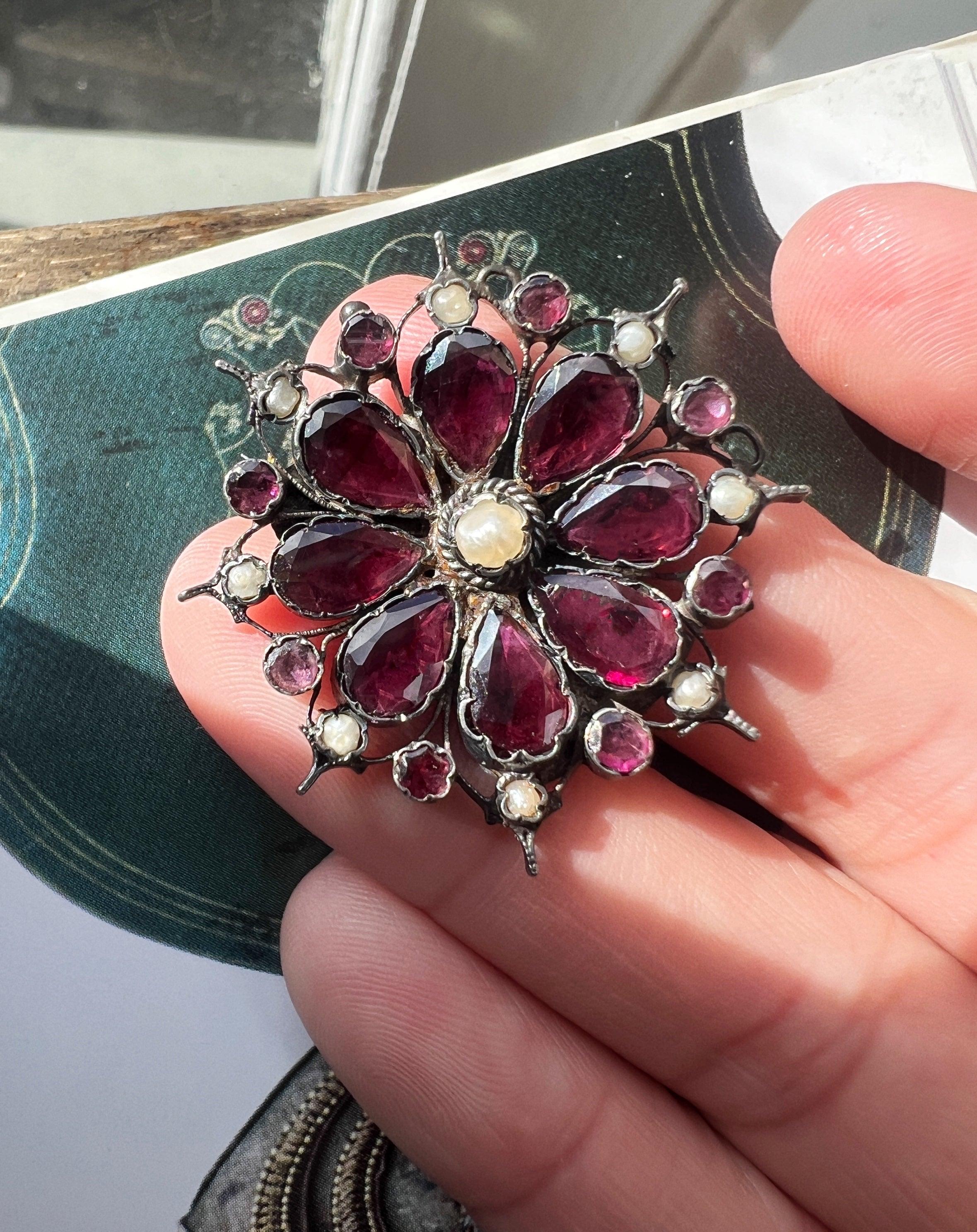 Georgian era flat cut garnet seed pearl flower brooch - Curiously timeless