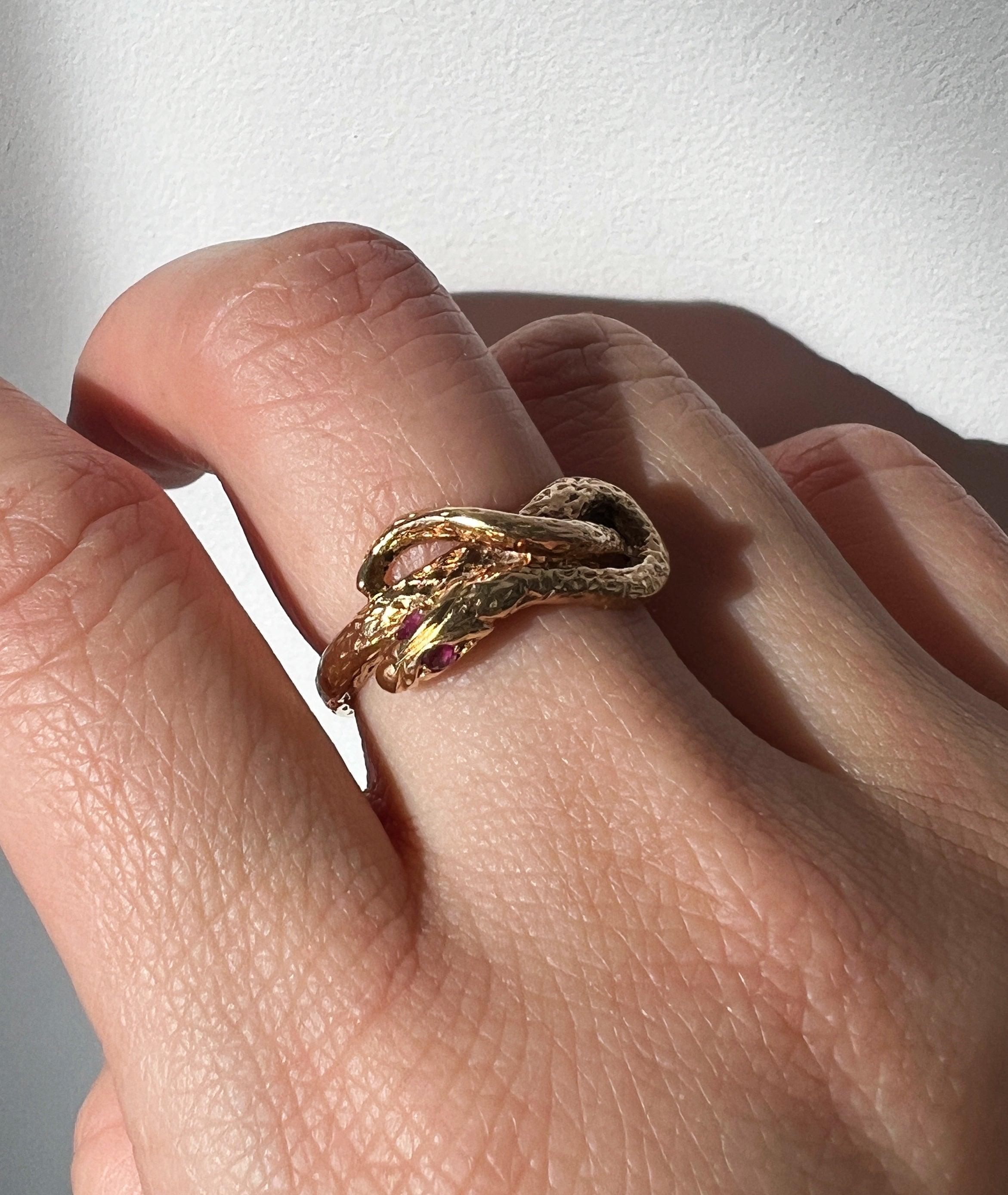 Chiseled 18k yellow plain gold twisted snake ring with ruby eyes - Curiously timeless