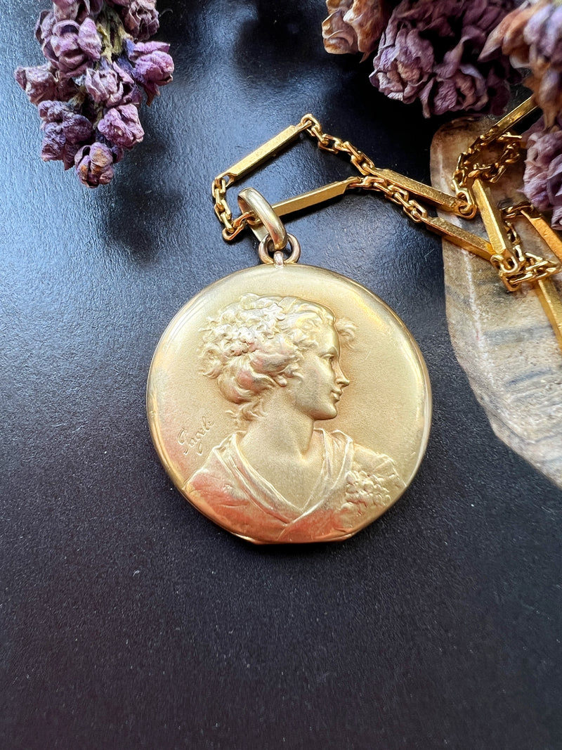 Pendant with woman's deals profile