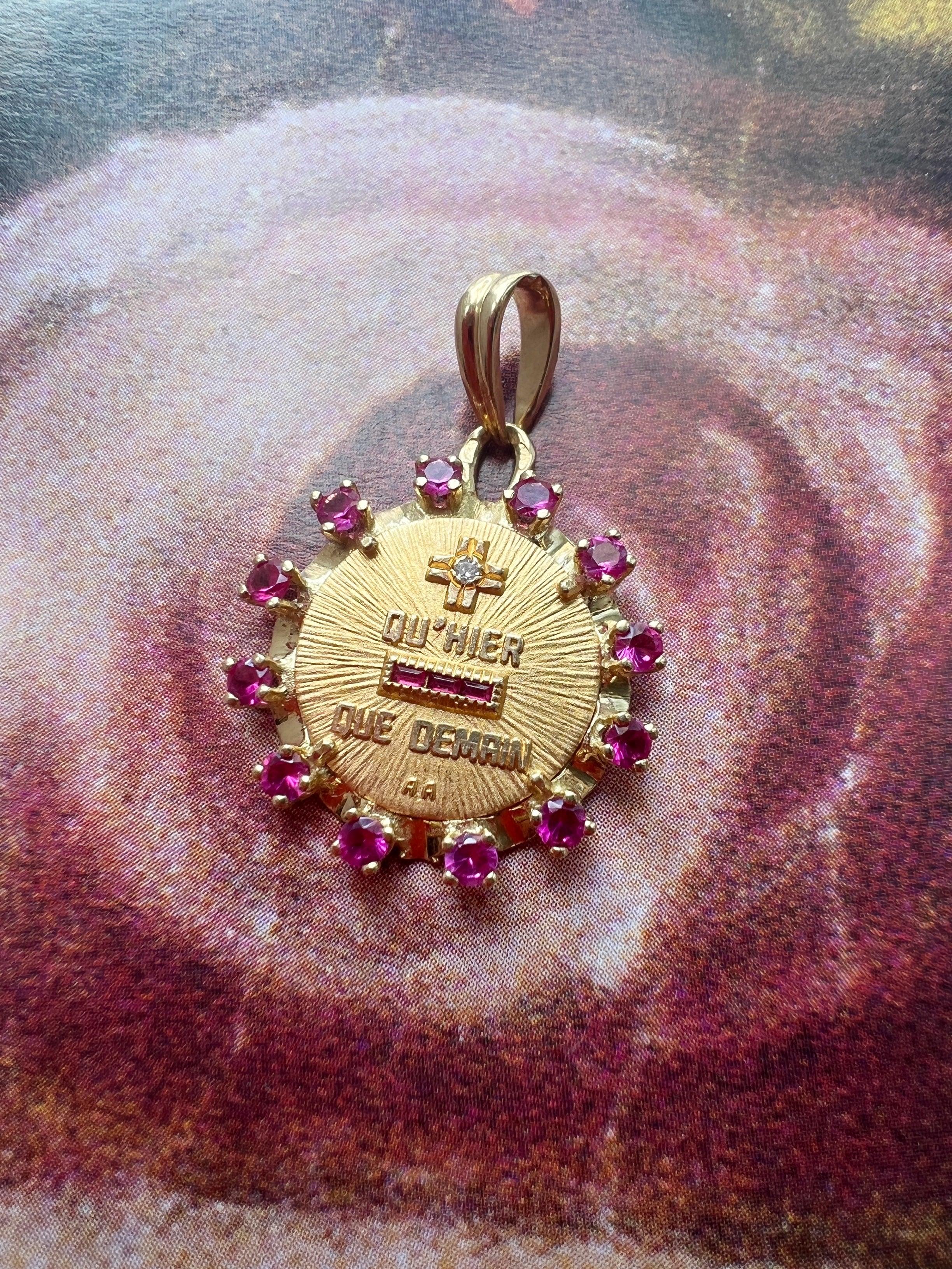 Vintage Augis 18K gold “more than yesterday, less than tomorrow” ruby frame medal - Curiously timeless