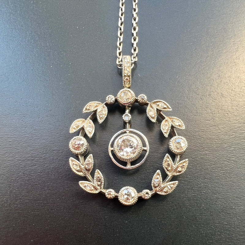 Elegant Edwardian era platinum diamond garland necklace and pendant