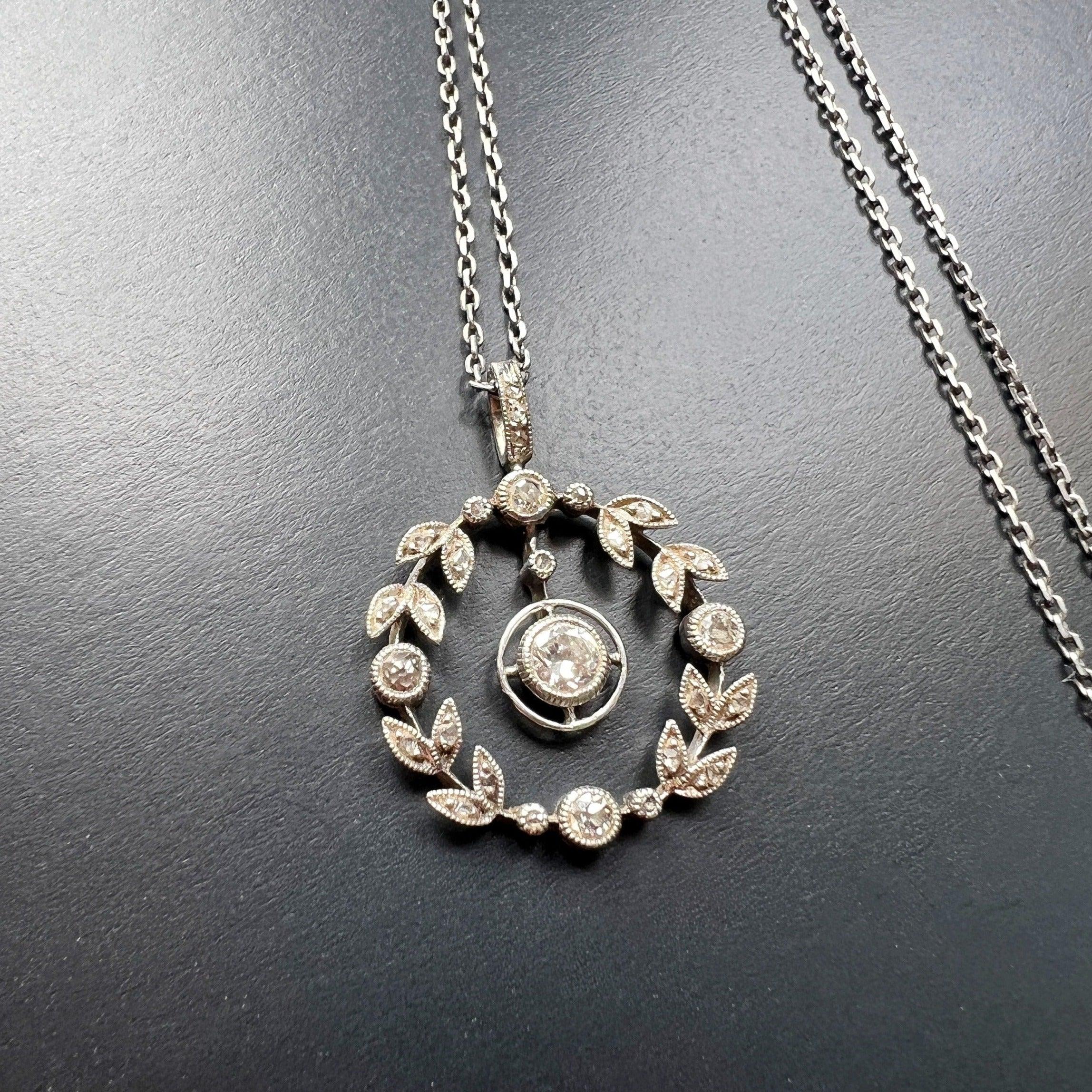 Elegant Edwardian era platinum diamond garland necklace and pendant - Curiously timeless