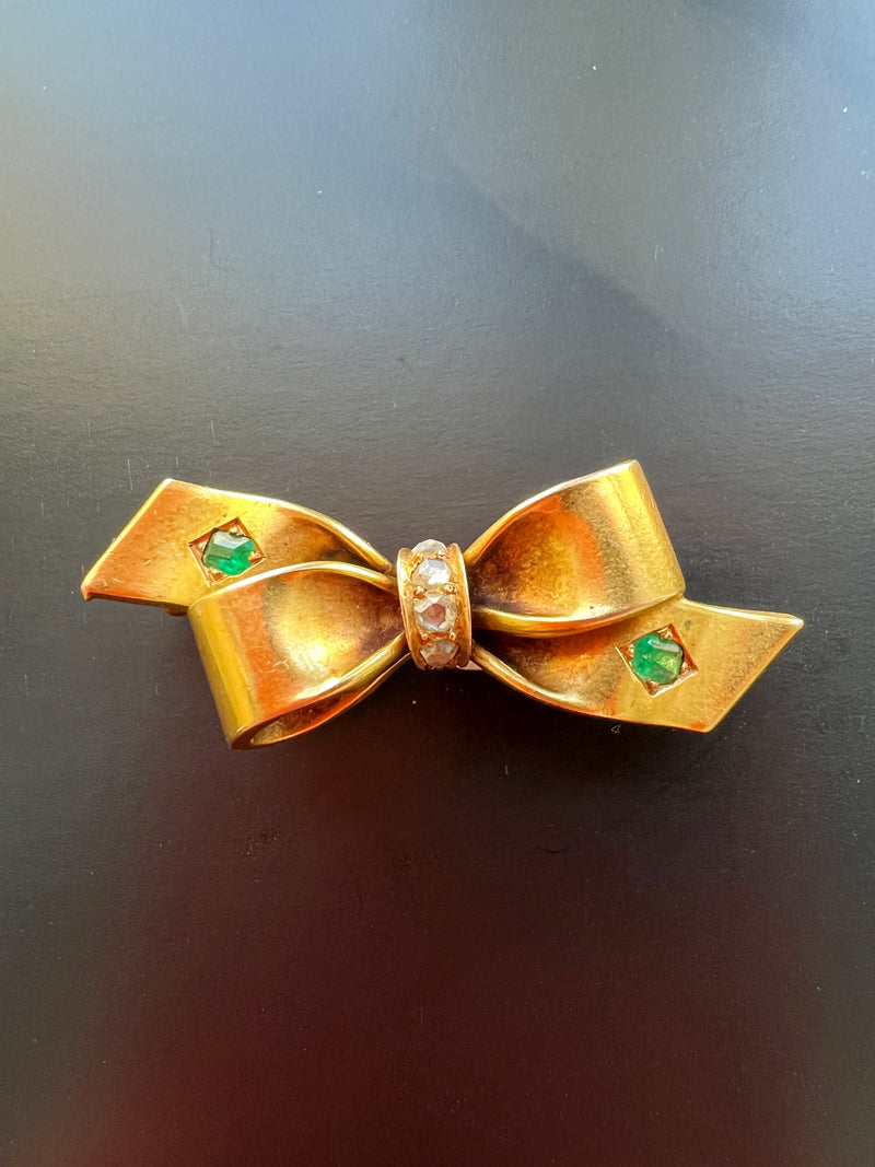 Very sweet antique 18K gold emerald diamond bow brooch