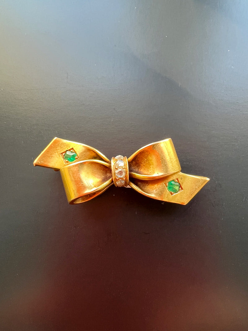 Very sweet antique 18K gold emerald diamond bow brooch