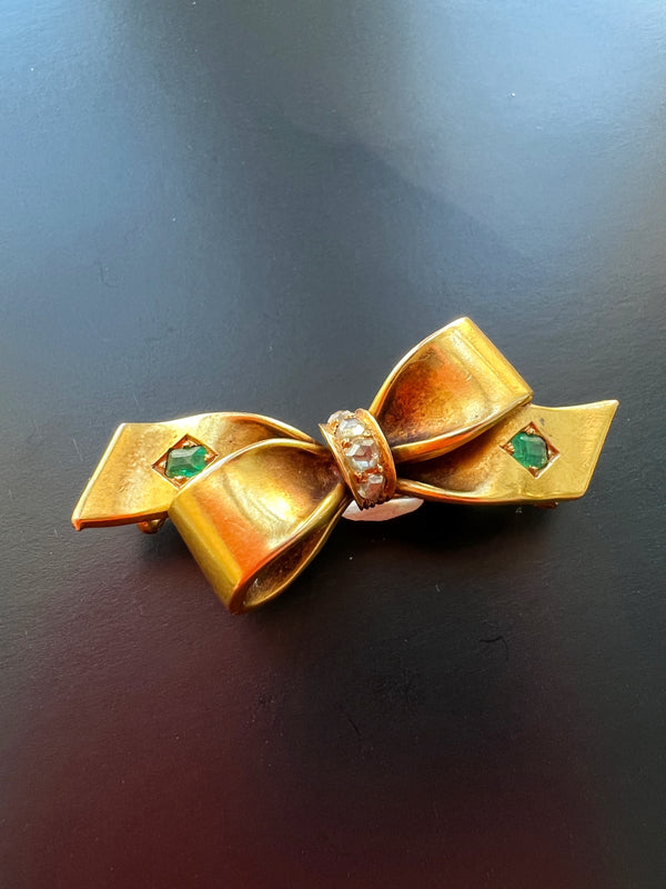 Very sweet antique 18K gold emerald diamond bow brooch